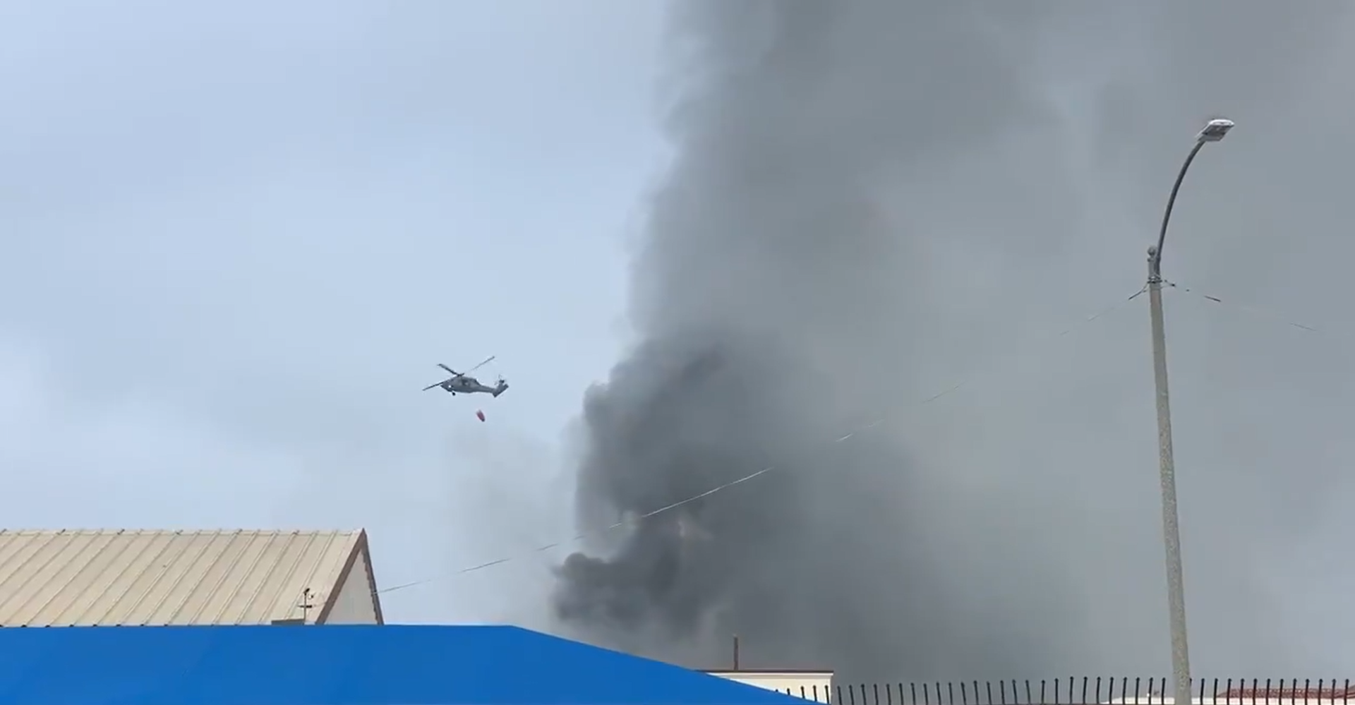 You are currently viewing Helicopter drops water on San Diego US Navy ship as “acrid” smoke still emitting