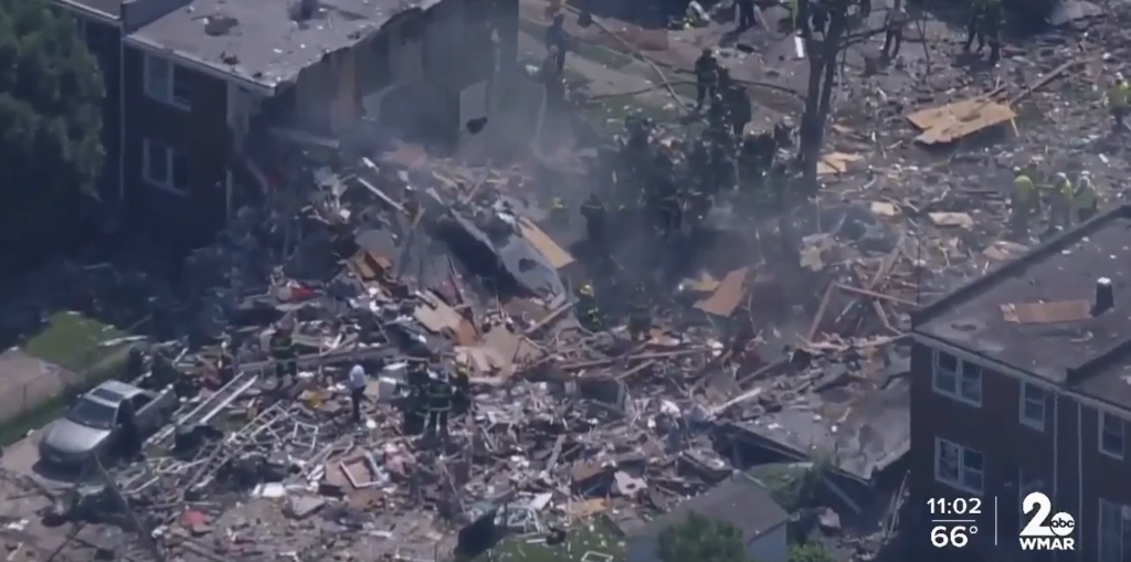 Hundreds of volunteers show up to help clean up Baltimore neighborhood ...